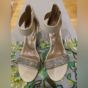 White with the silver sparkle heel. 2 3/4 inch heal. Size 7M.